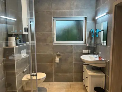 Ein Badezimmer in der Unterkunft Haus Koblenz