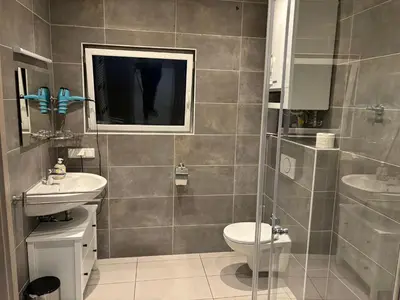 Ein Badezimmer in der Unterkunft Haus Deutsches-Eck