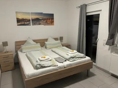 Ein Bett oder Betten in einem Zimmer der Unterkunft Haus Deutsches-Eck