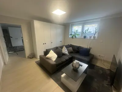 Ein Sitzbereich in der Unterkunft Ferienwohnung Trier Ruwer Mosel