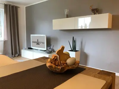Ein Bett oder Betten in einem Zimmer der Unterkunft Destino - FeWo bei COCHEM mit beheiztem Pool