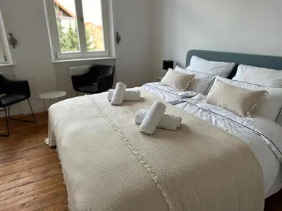 Ein Bett oder Betten in einem Zimmer der Unterkunft SweetLeopold1