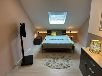 Ein Bett oder Betten in einem Zimmer der Unterkunft Ferienwohnung AnGa