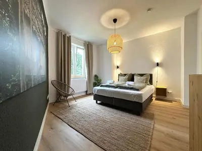 Ein Bett oder Betten in einem Zimmer der Unterkunft Kostenloses Parken - Altstadtnah - 100m Mosel - K-1-M