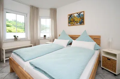 Ein Bett oder Betten in einem Zimmer der Unterkunft Fewo-Eifelvielfalt