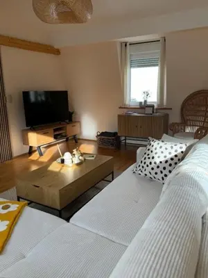 Ein Bett oder Betten in einem Zimmer der Unterkunft Residenz zu Caub - Pfalzgrafenstein Appartment