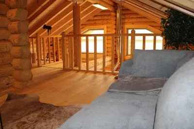 Ein Sitzbereich in der Unterkunft Blockhaus eighteen