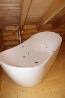 Ein Badezimmer in der Unterkunft Blockhaus eighteen