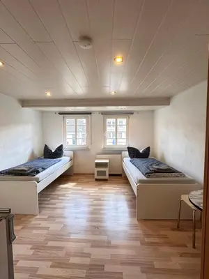 Ein Bett oder Betten in einem Zimmer der Unterkunft Apartment am Markt
