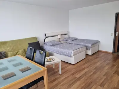 Ein Bett oder Betten in einem Zimmer der Unterkunft B1011, gemütliches Appartement mit Ausblick