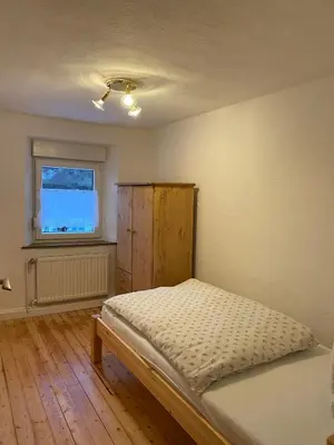 Ein Bett oder Betten in einem Zimmer der Unterkunft Ferienhaus Naturtraum Eifel