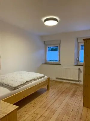 Ein Bett oder Betten in einem Zimmer der Unterkunft Ferienhaus Naturtraum Eifel