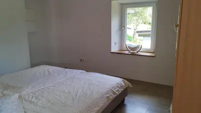 Ein Bett oder Betten in einem Zimmer der Unterkunft Ferienwohnung Hühn
