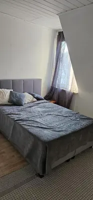 Ein Bett oder Betten in einem Zimmer der Unterkunft Charmante Ferienwohnung