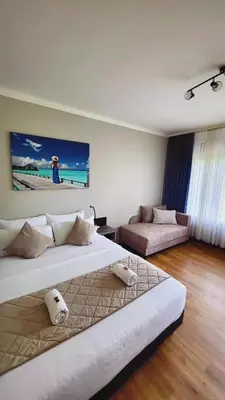Ein Bett oder Betten in einem Zimmer der Unterkunft Apartment mit Balkon am Rhein