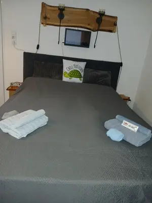 Ein Bett oder Betten in einem Zimmer der Unterkunft Chillkröte