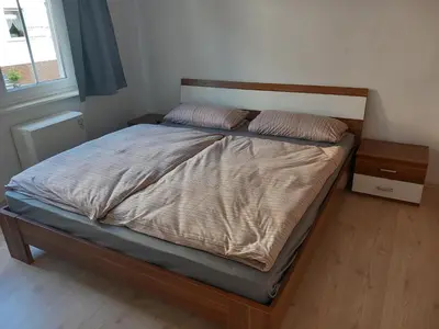Ein Bett oder Betten in einem Zimmer der Unterkunft Ferienhaus Welches