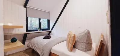 Ein Bett oder Betten in einem Zimmer der Unterkunft Eifel Residence 3