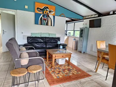 Ein Sitzbereich in der Unterkunft Ferienhaus Waldidyll