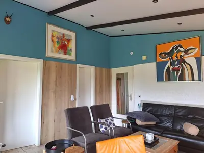 Ein Sitzbereich in der Unterkunft Ferienhaus Waldidyll