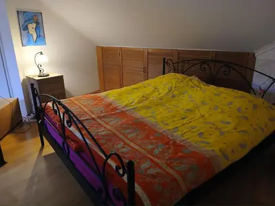 Ein Bett oder Betten in einem Zimmer der Unterkunft Ferienwohnung mit herrlichem Moselblick - b63990