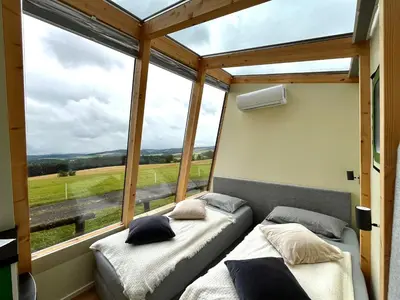Ein Sitzbereich in der Unterkunft Tiny House am Nürburgring
