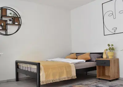 Ein Bett oder Betten in einem Zimmer der Unterkunft FeWo Stadtjuwel Idar-Oberstein
