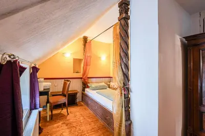 Ein Bett oder Betten in einem Zimmer der Unterkunft Die Alte Metzgerei