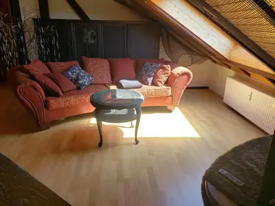 Ein Sitzbereich in der Unterkunft Batcave