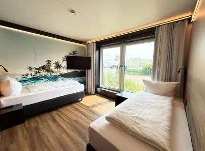 Ein Bett oder Betten in einem Zimmer der Unterkunft MYK Hotel by WMM Hotels