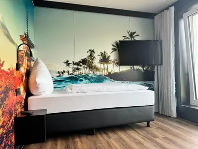 Ein Bett oder Betten in einem Zimmer der Unterkunft MYK Hotel by WMM Hotels