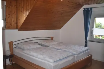 Ein Bett oder Betten in einem Zimmer der Unterkunft Ferienhaus Auf Pötsch