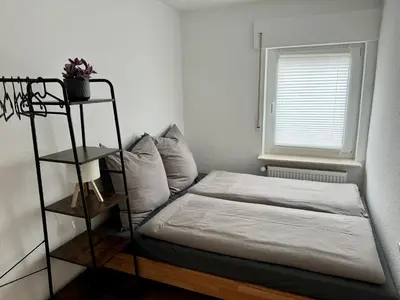 Ein Bett oder Betten in einem Zimmer der Unterkunft PRIME LODGE Koblenz