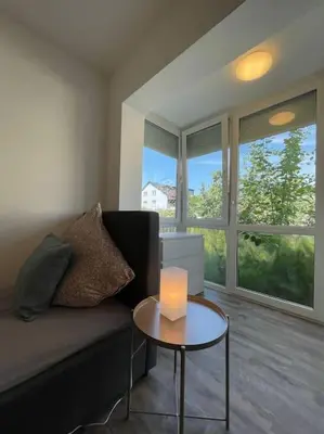 Ein Sitzbereich in der Unterkunft Gemütliche Ferienwohnung in Nickenich für 5 Gäste