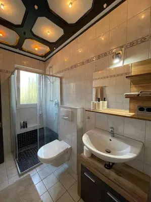 Ein Badezimmer in der Unterkunft Gemütliche Ferienwohnung in Nickenich für 5 Gäste