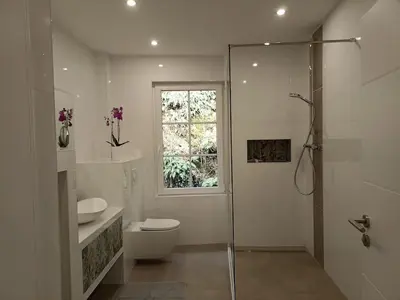 Ein Badezimmer in der Unterkunft Ferienhaus Alte Beurener Mühle