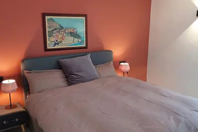 Ein Bett oder Betten in einem Zimmer der Unterkunft Ferienhaus Alte Beurener Mühle