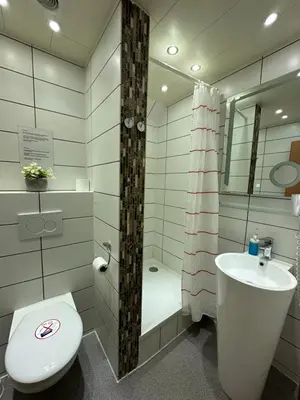 Ein Badezimmer in der Unterkunft Hotel Holl Beyra