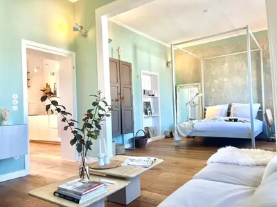 Ein Bett oder Betten in einem Zimmer der Unterkunft Minimalus Koblenz Apartment II