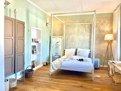 Ein Bett oder Betten in einem Zimmer der Unterkunft Minimalus Koblenz Apartment II