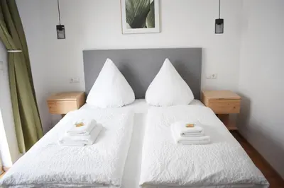 Ein Bett oder Betten in einem Zimmer der Unterkunft Hike Inn Hotels by Emmerich
