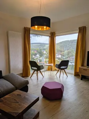 Ein Sitzbereich in der Unterkunft Ferienhaus Am Baumwipfel