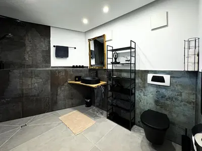 Ein Badezimmer in der Unterkunft King Clusion