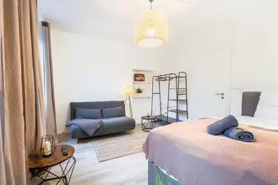 Ein Bett oder Betten in einem Zimmer der Unterkunft Haus Lahnblick Bleser Appartements