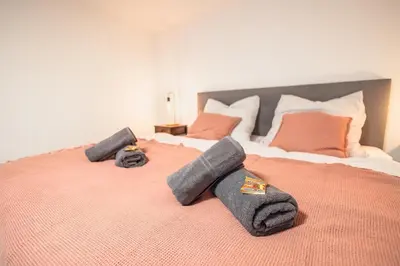 Ein Bett oder Betten in einem Zimmer der Unterkunft Haus Lahnblick Bleser Appartements