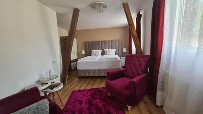 Ein Bett oder Betten in einem Zimmer der Unterkunft Hotel Osteria Del Vino Cochem