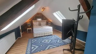 Ein Bett oder Betten in einem Zimmer der Unterkunft Hotel Osteria Del Vino Cochem