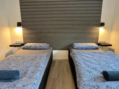 Ein Bett oder Betten in einem Zimmer der Unterkunft Rhaunen Apartments