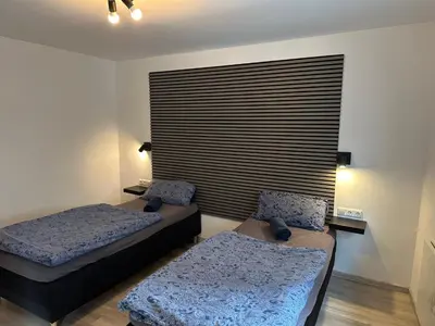 Ein Bett oder Betten in einem Zimmer der Unterkunft Rhaunen Apartments