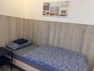 Ein Bett oder Betten in einem Zimmer der Unterkunft Rhaunen Apartments
